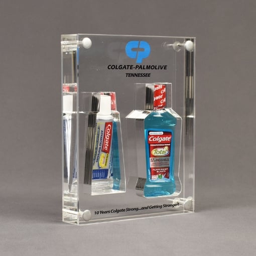 Angle view of x-large Allure™ Acrylic Encasement Award with Colgate toothpaste and mouthwash bottle encased into clear acrylic showing full color imprint.