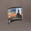 Medium-sized Lucite® Curved Process Plaque shown at an angle, highlighting vibrant offshore drilling imagery and layered acrylic depth