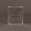 Front-facing view of large slim Lucite® embedment styled like a book, showcasing company logos and commemorative text for a business deal