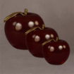 Group of three solid red Lucite® apples with gold leaf, in small, medium, and large sizes for versatile display or gifting.
