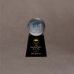 Lucite® sphere embedment with blue logo, mounted on a black acrylic base with gold text recognizing an Insurance Agent of the Year