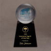 Massive Lucite® sphere with blue logo mounted on a black base with gold engraving, honoring 2021’s top Insurance Agent