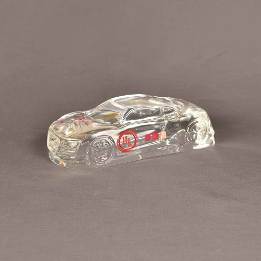 Clear acrylic stock car award in a small size, shown from a dynamic front-side angle with logo imprint.